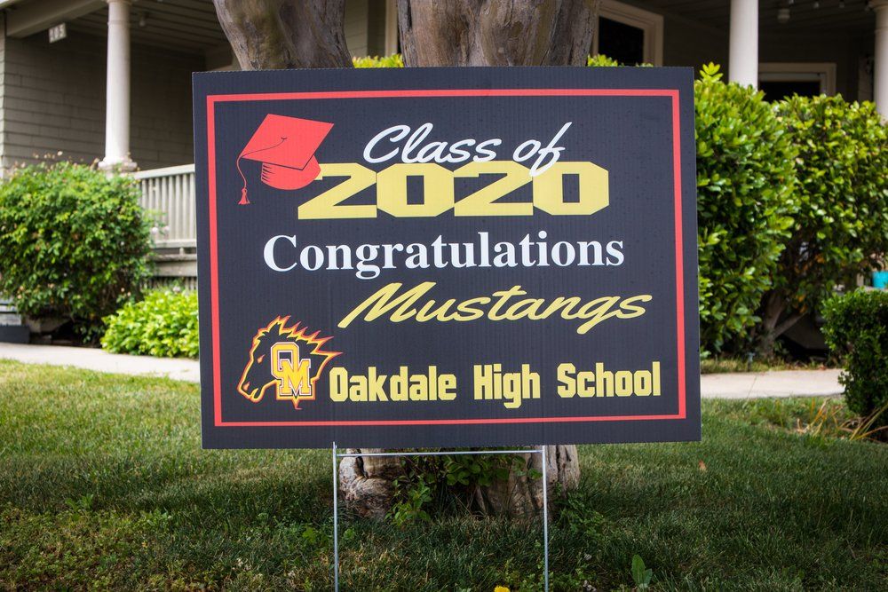 Black graduation yard sign for Oakdale High School 