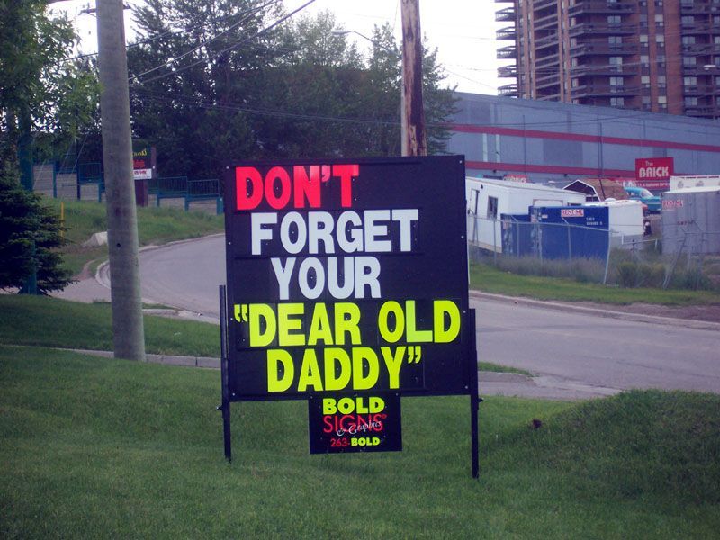 A sign that says do n't forget your dear old daddy