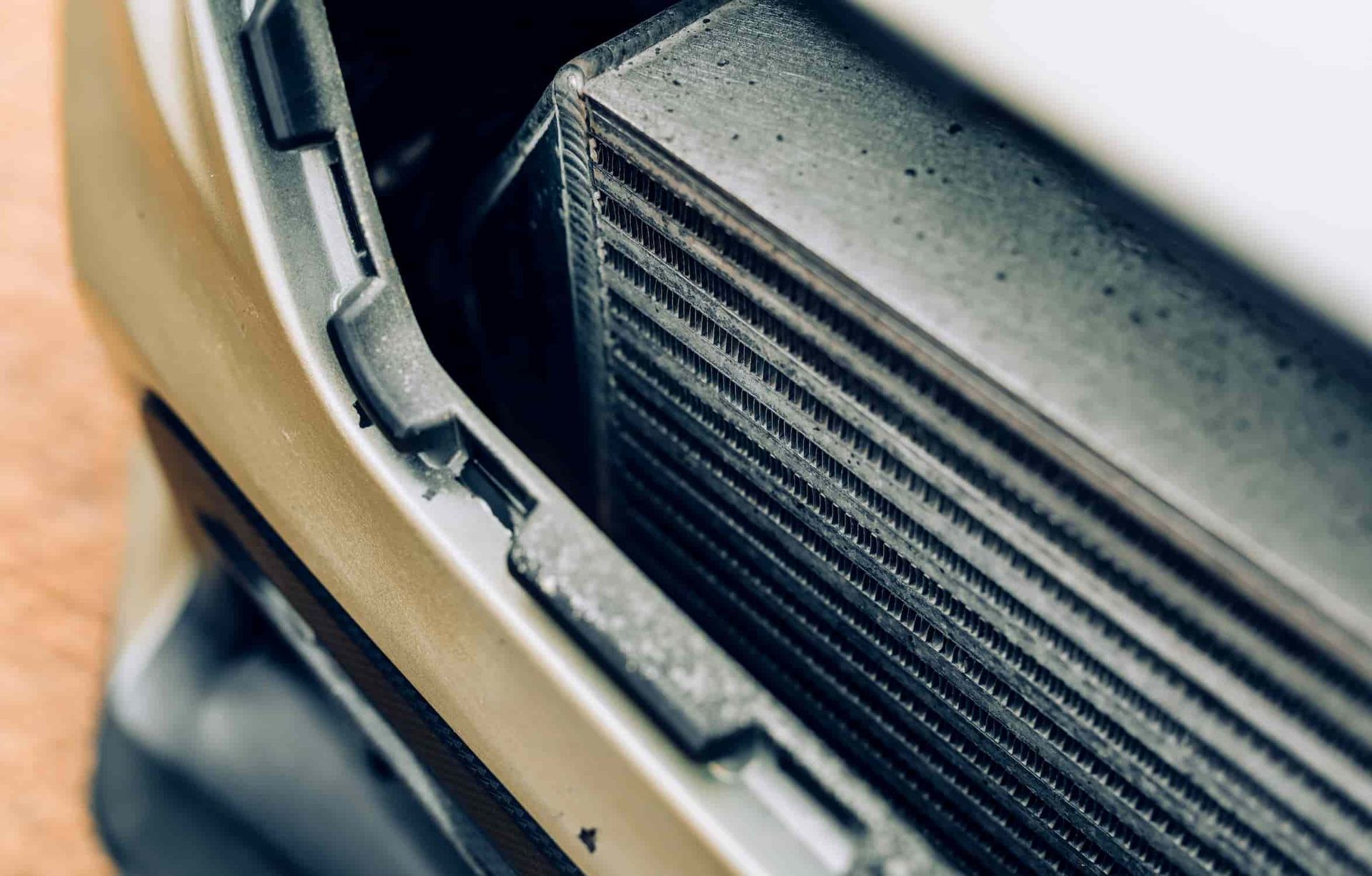 A Close Up of a Radiator on the Front of a Car — Berrimah Radiator Service In Alice Springs, NT