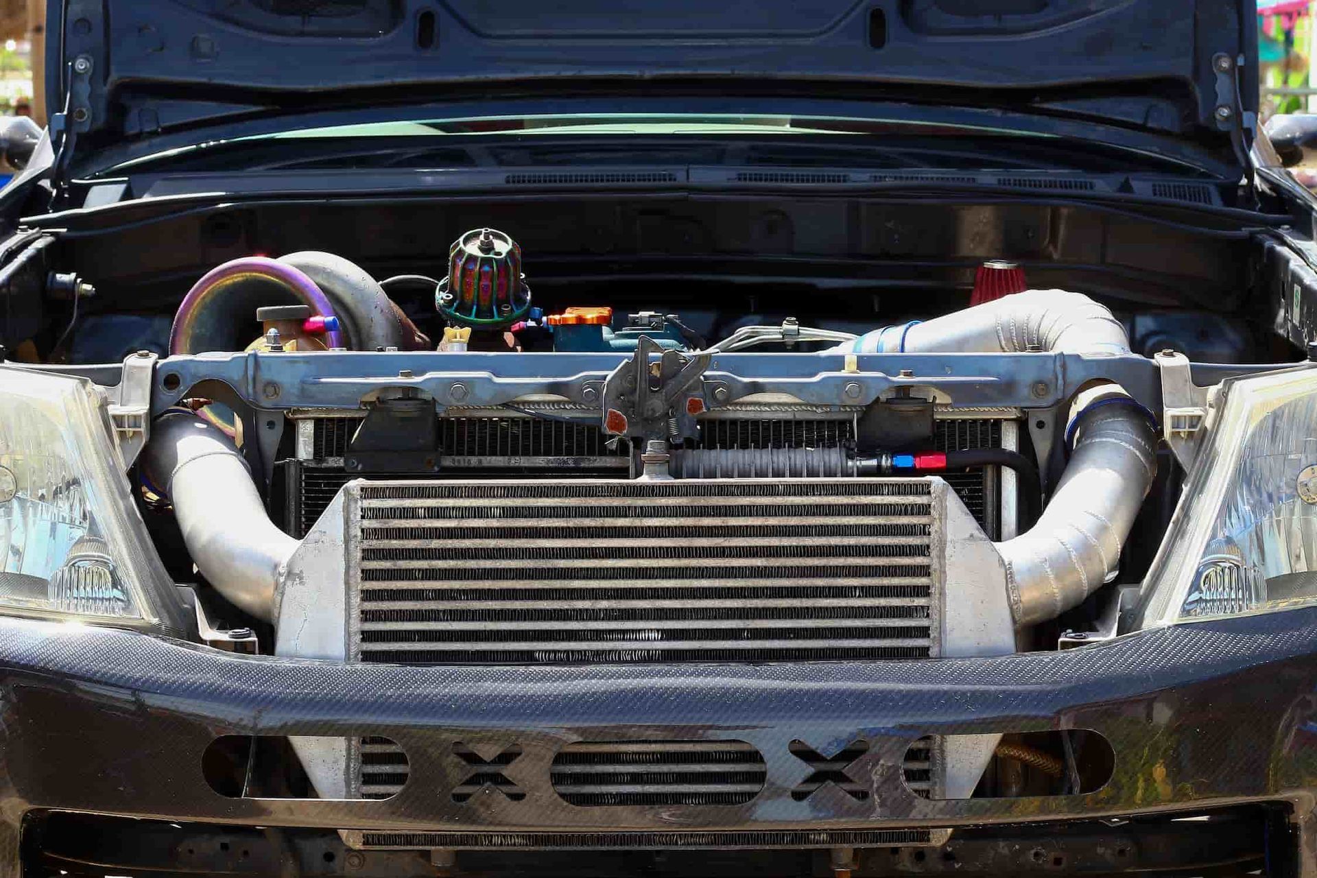 A Close Up of a Car Engine With the Hood Open — Berrimah Radiator Service In Berrimah, NT