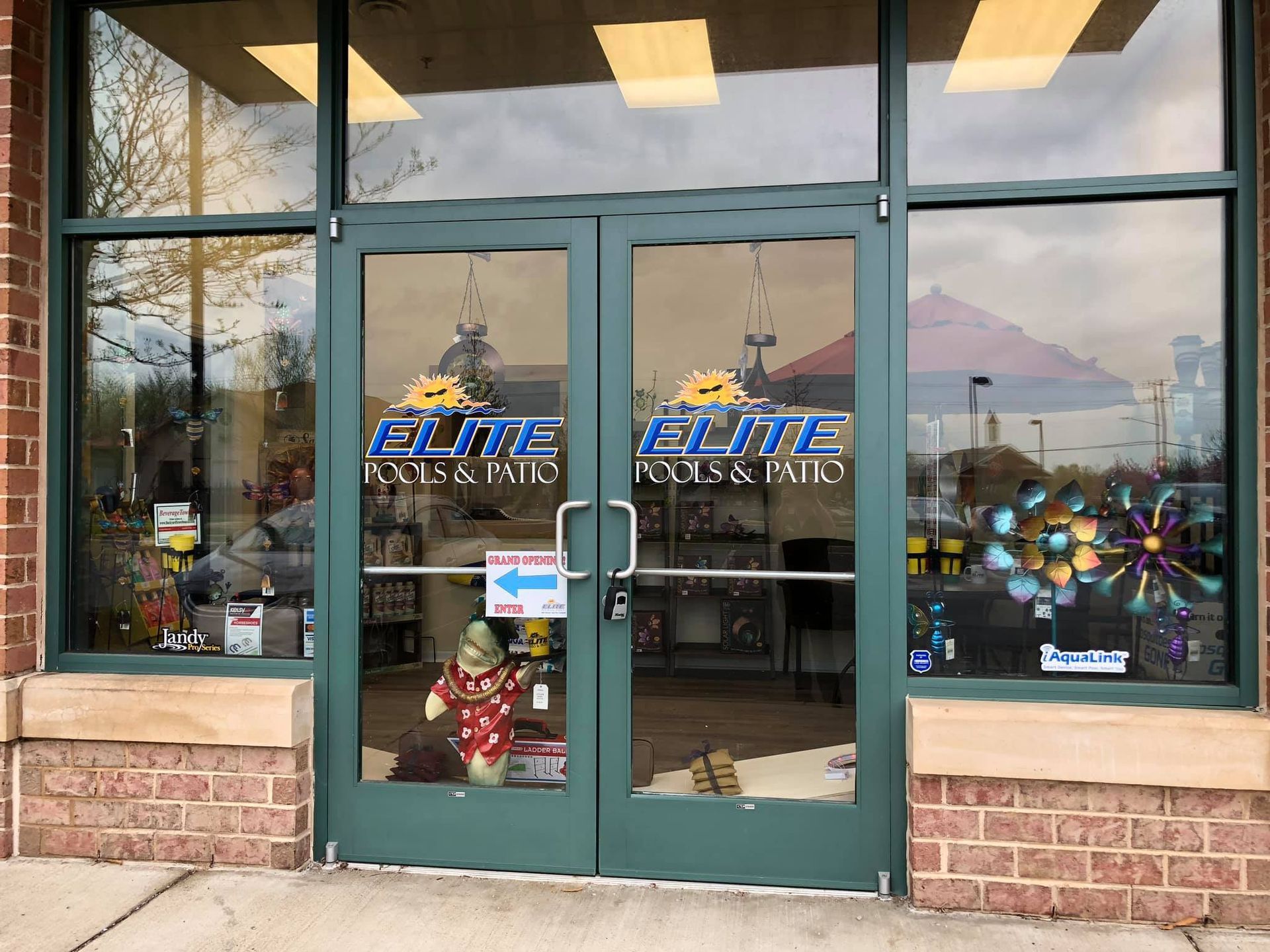 Green doors of a business with 