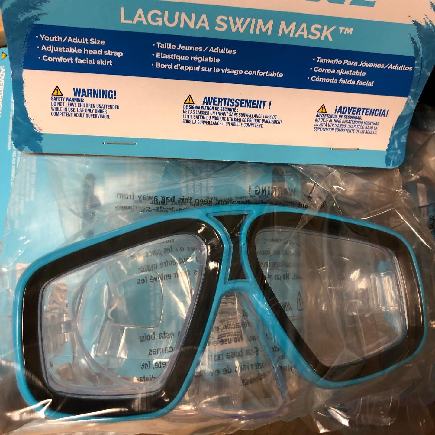 Blue and black Laguna swim mask in packaging.