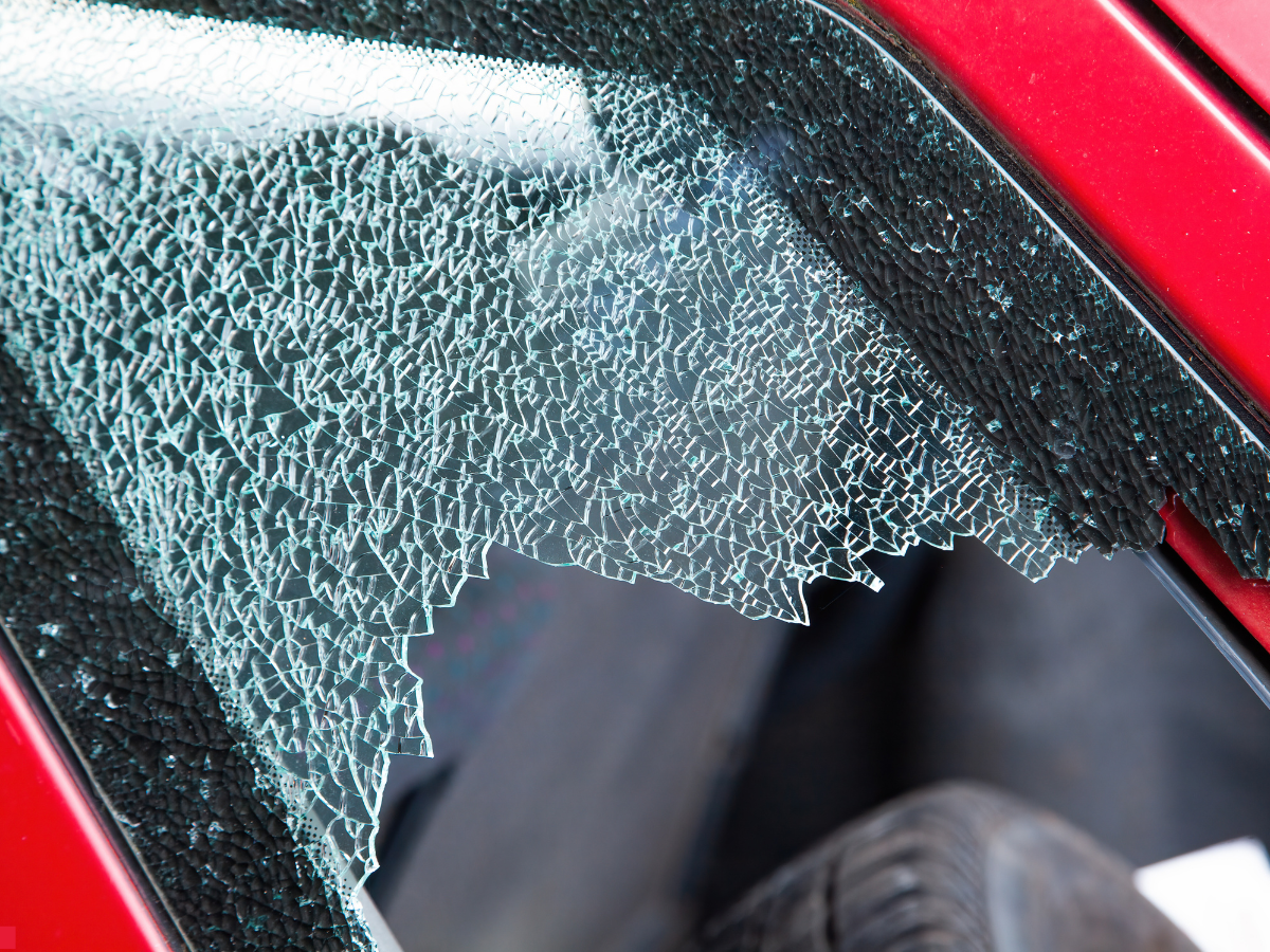 smashed side car window that needs to be replaced