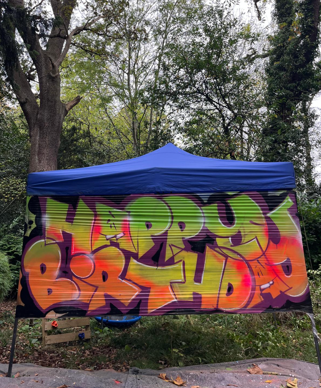 Gazebo and graffiti backdrop
