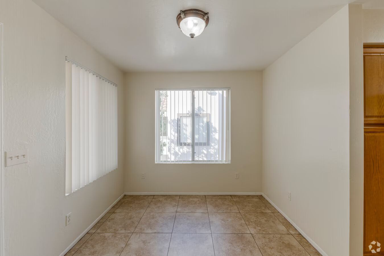 Photo of a dining room with a large, square shape window