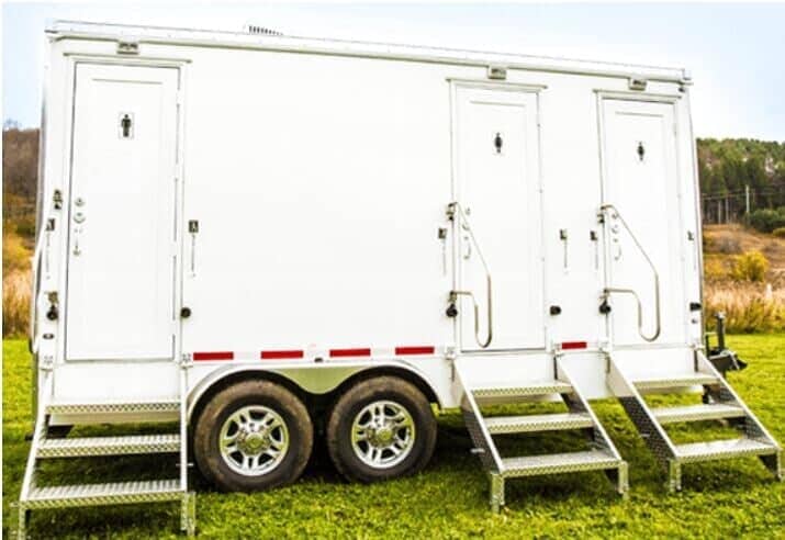 Outside look of Royal Plus 3 Stall Restroom Trailer — Toilets Rental in Clarksville, NY