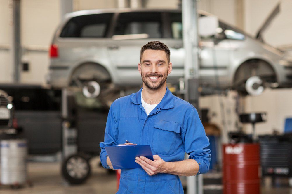 Happy smiling auto mechanic man — Auto Electrician Near Me in Acacia Hills NT