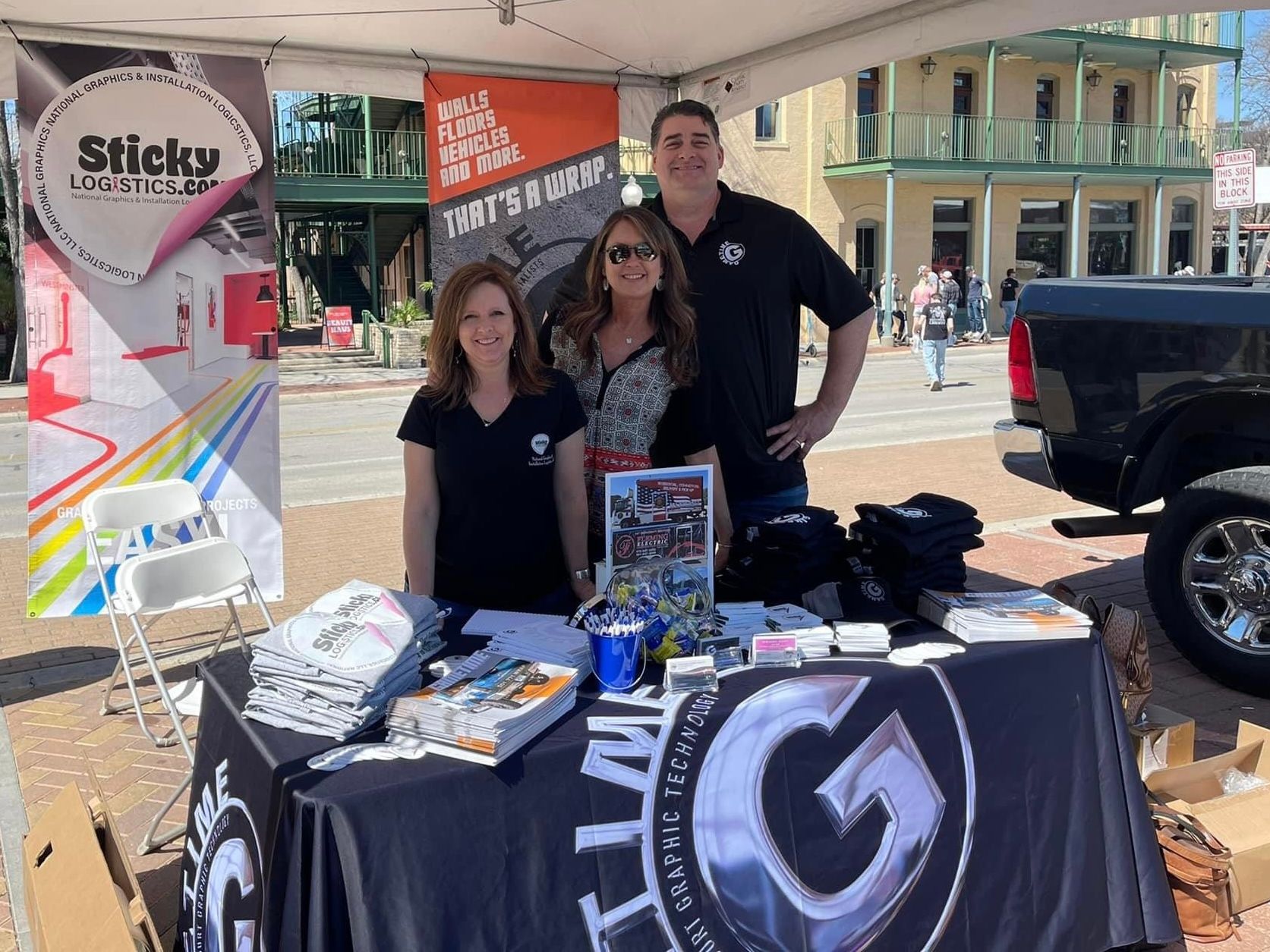 Two Woman And One Man In A Booth — Maumelle, AR — Sticky Logistics