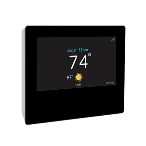A black thermostat with a screen that says 74 degrees on it.