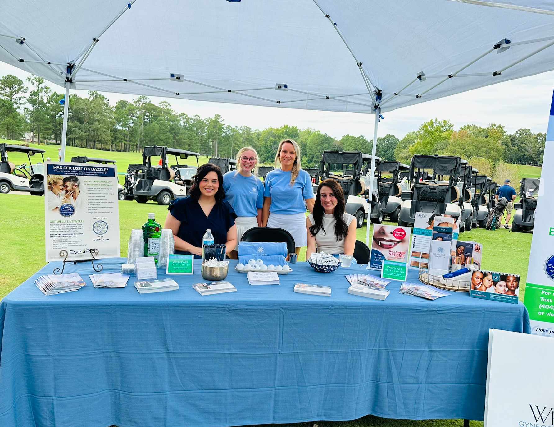 Hands clasped together in a team huddle, symbolizing unity and collaboration.
