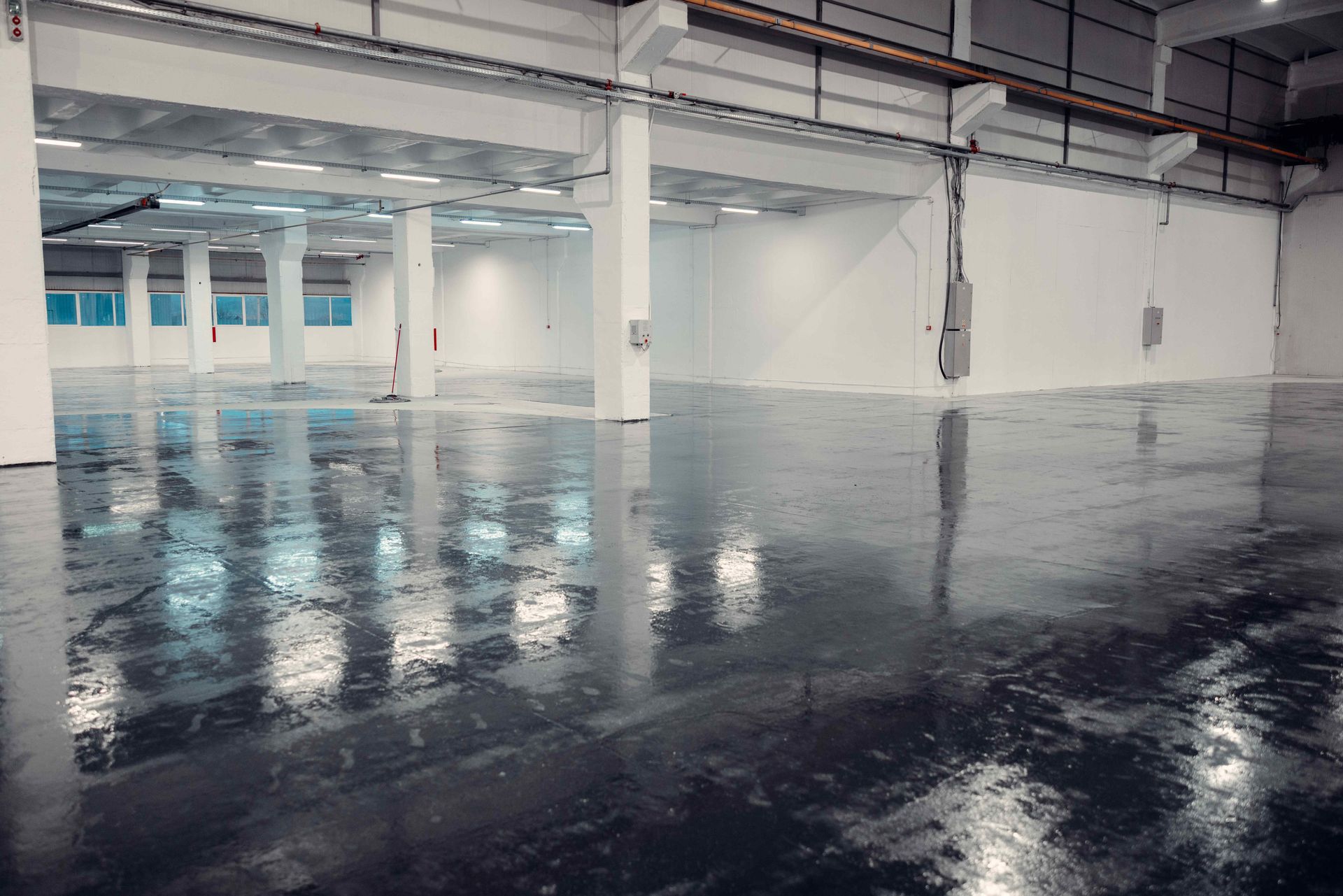 Business Building With Gray Black Epoxy Resin Resurfaced Concrete