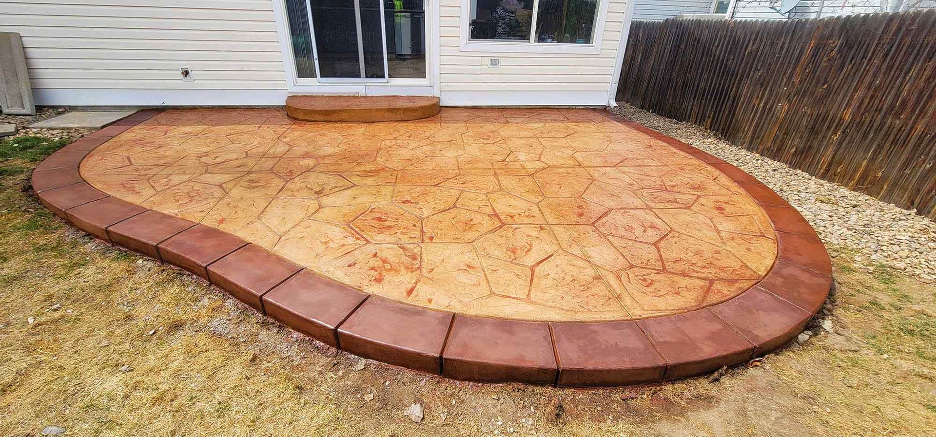 Stamped Concrete Patio Dark Red And Tan Colors