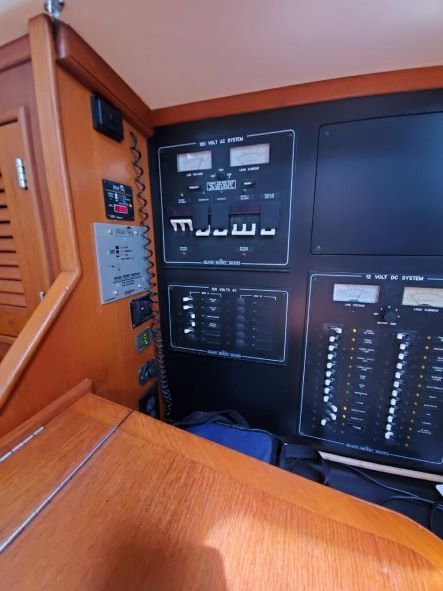 A control panel on a boat that says ' eee ' on it