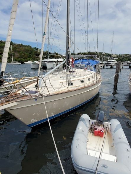 A boat with the number 13 on the side of it