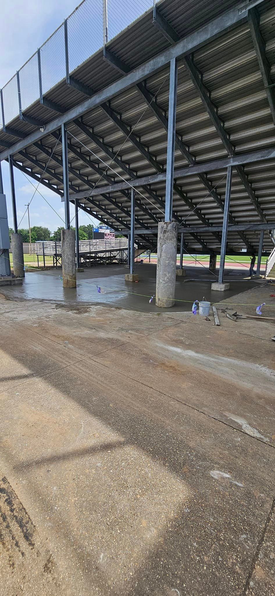 A bridge over a body of water with a fence around it.