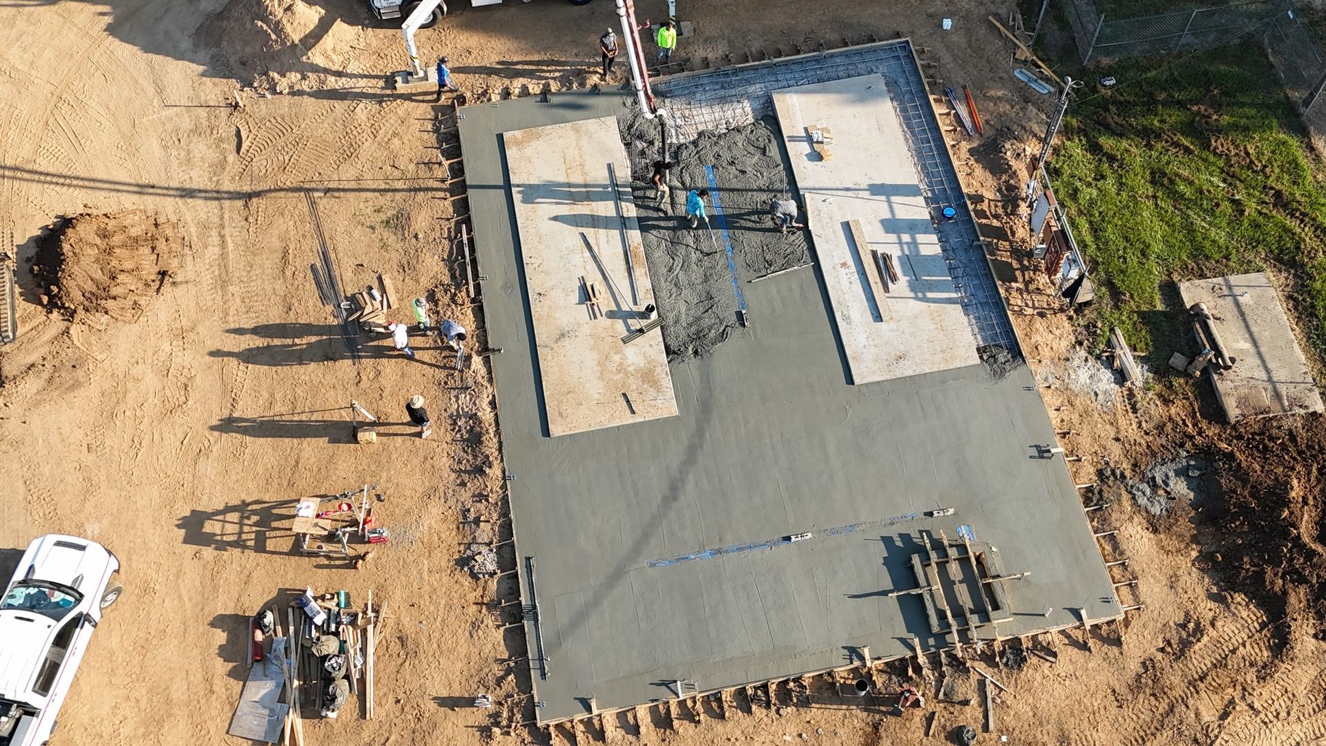 An aerial view of a basketball court under construction.