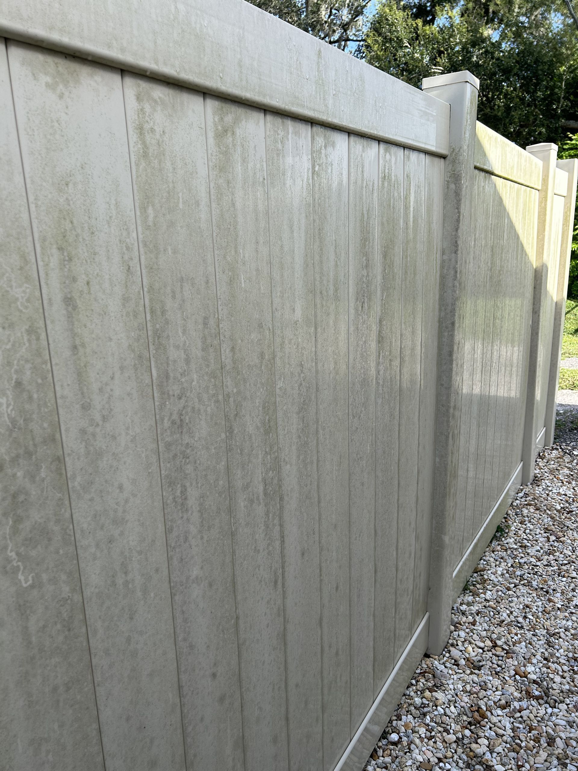 Pressure washing of a fence