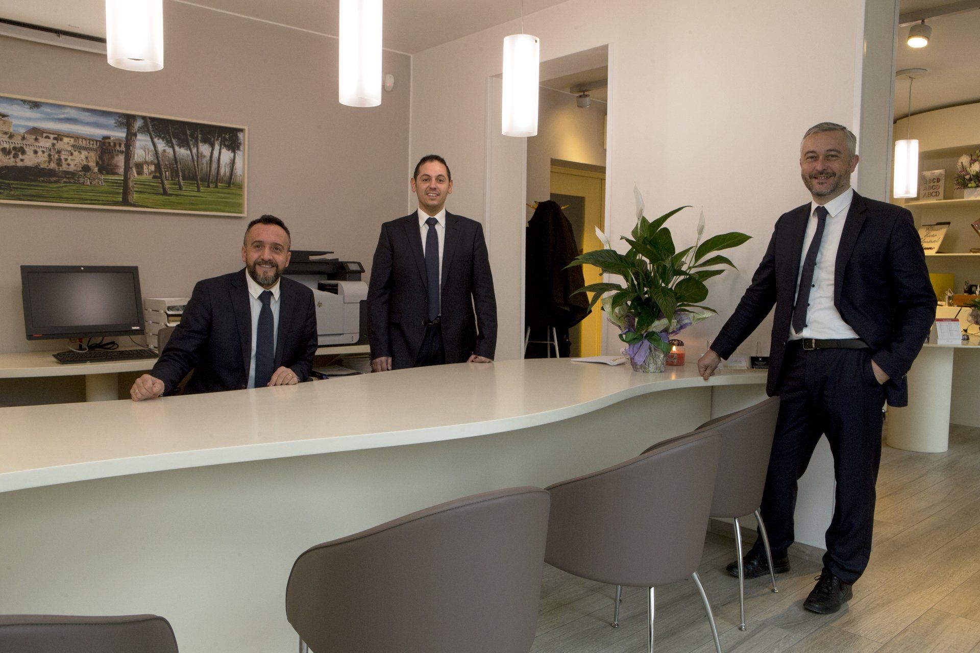 ufficio interno con parquet e triade