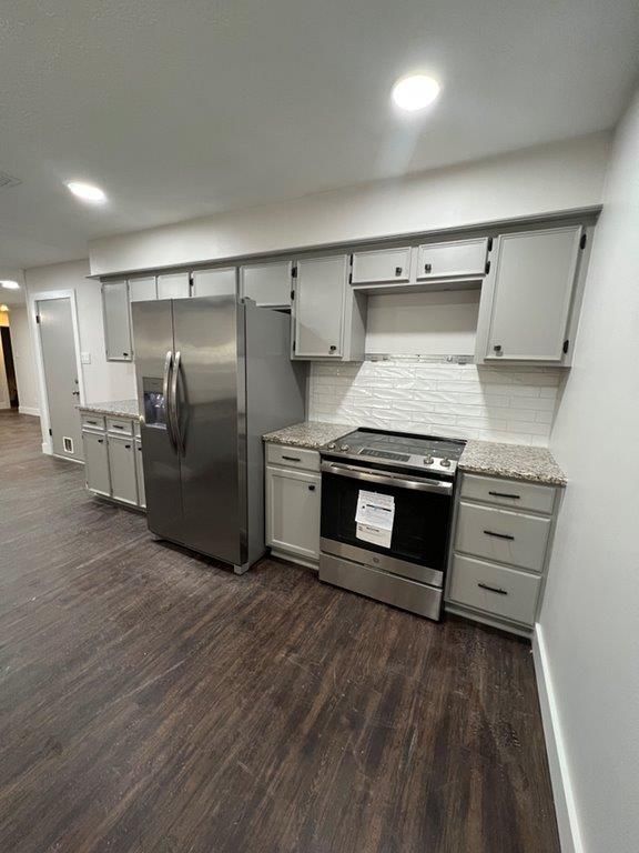 Upgraded kitchen with stainless steel appliances.