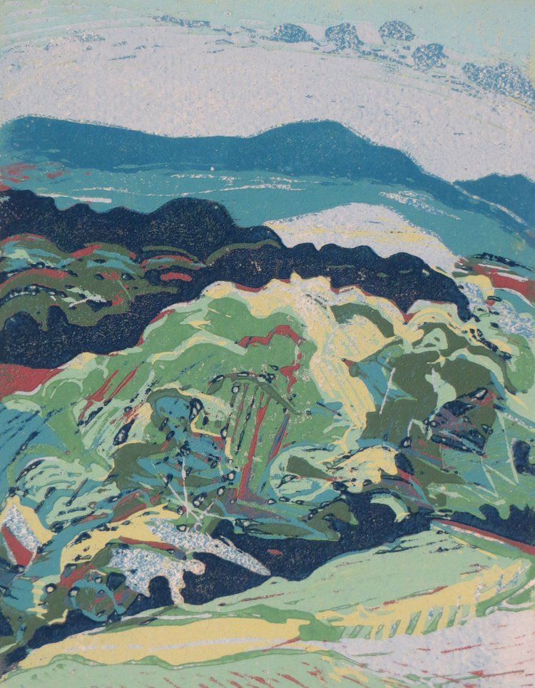 A colorful landscape with rolling hills, trees, and a pale blue sky