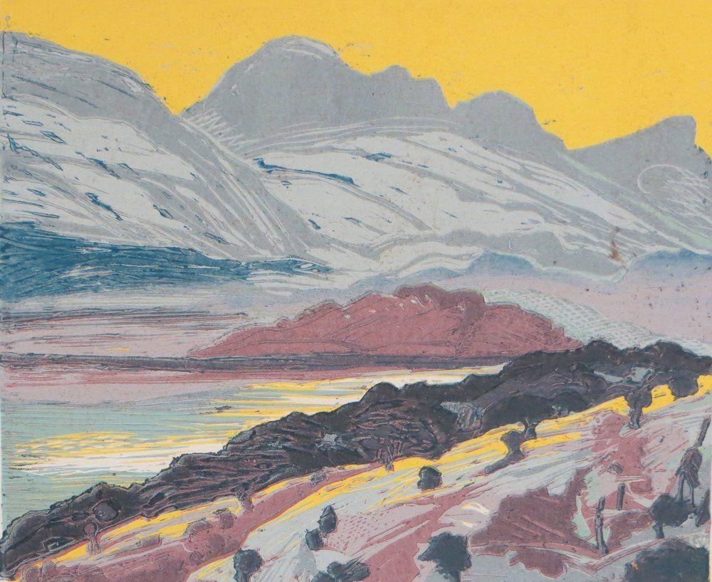 Mountains over a lake and hillside