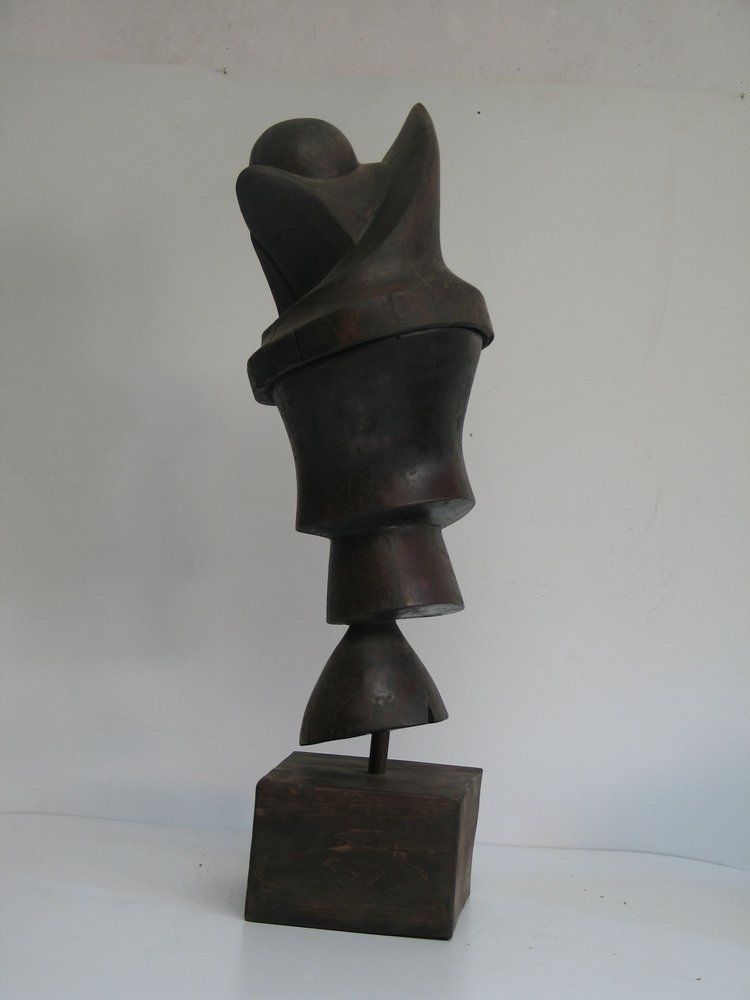 Abstract bronze sculpture on a wooden base