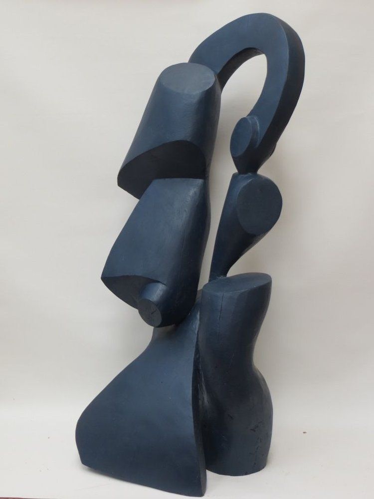 Abstract blue sculpture composed of geometric shapes