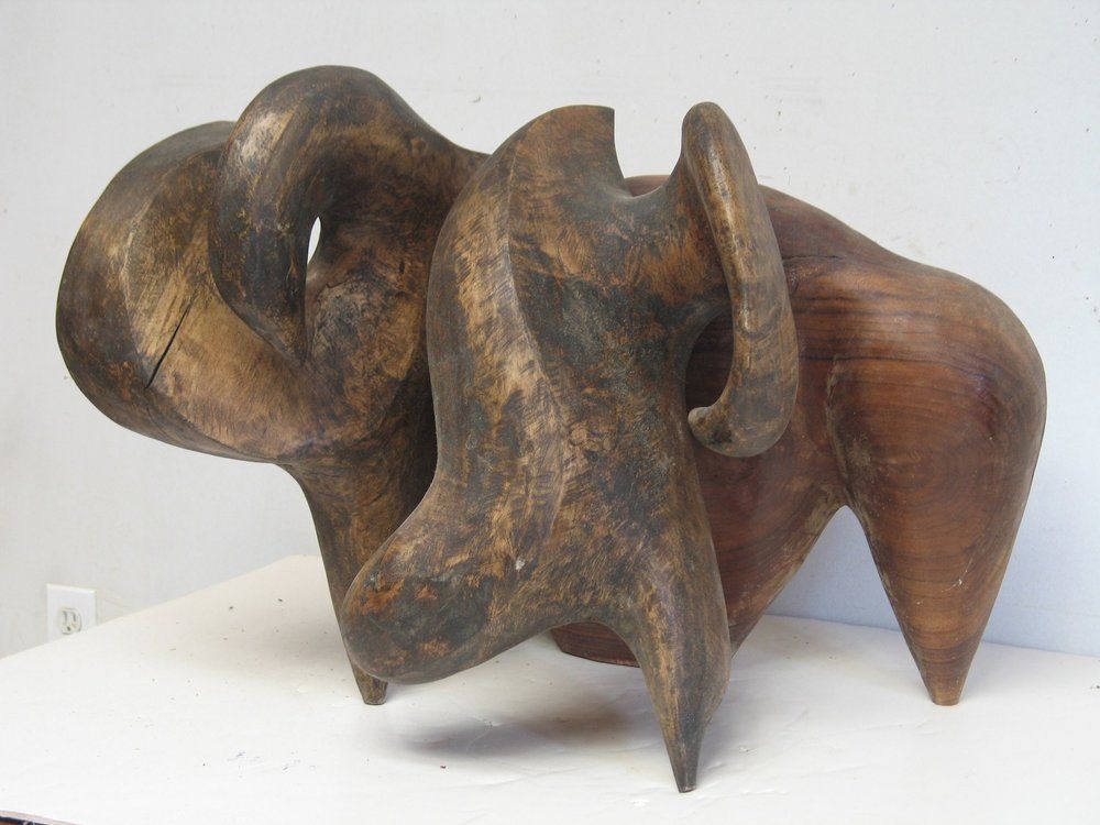 Wooden abstract sculpture with rounded forms 