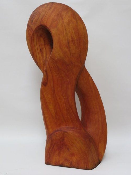 Wooden sculpture with an intertwined loop shape