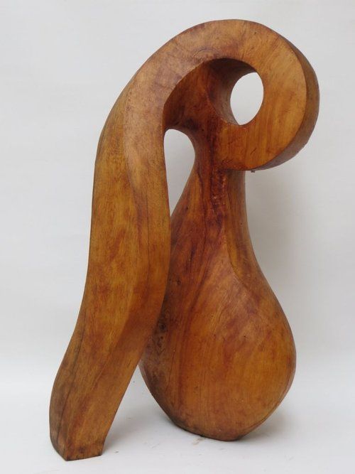 Abstract wooden sculpture of a curving