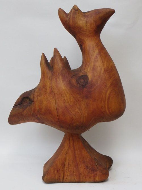Wooden sculpture of a bird-like form 