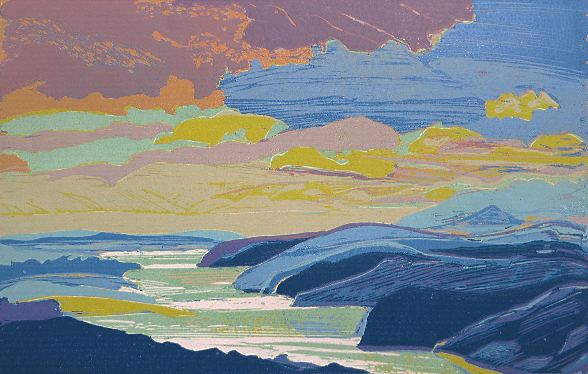 Coastal landscape with colorful sky and layered blue, purple, and yellow cliffs and water.