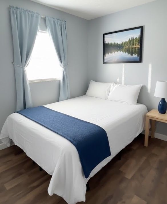 A kitchen in a small house with a sink and a window.