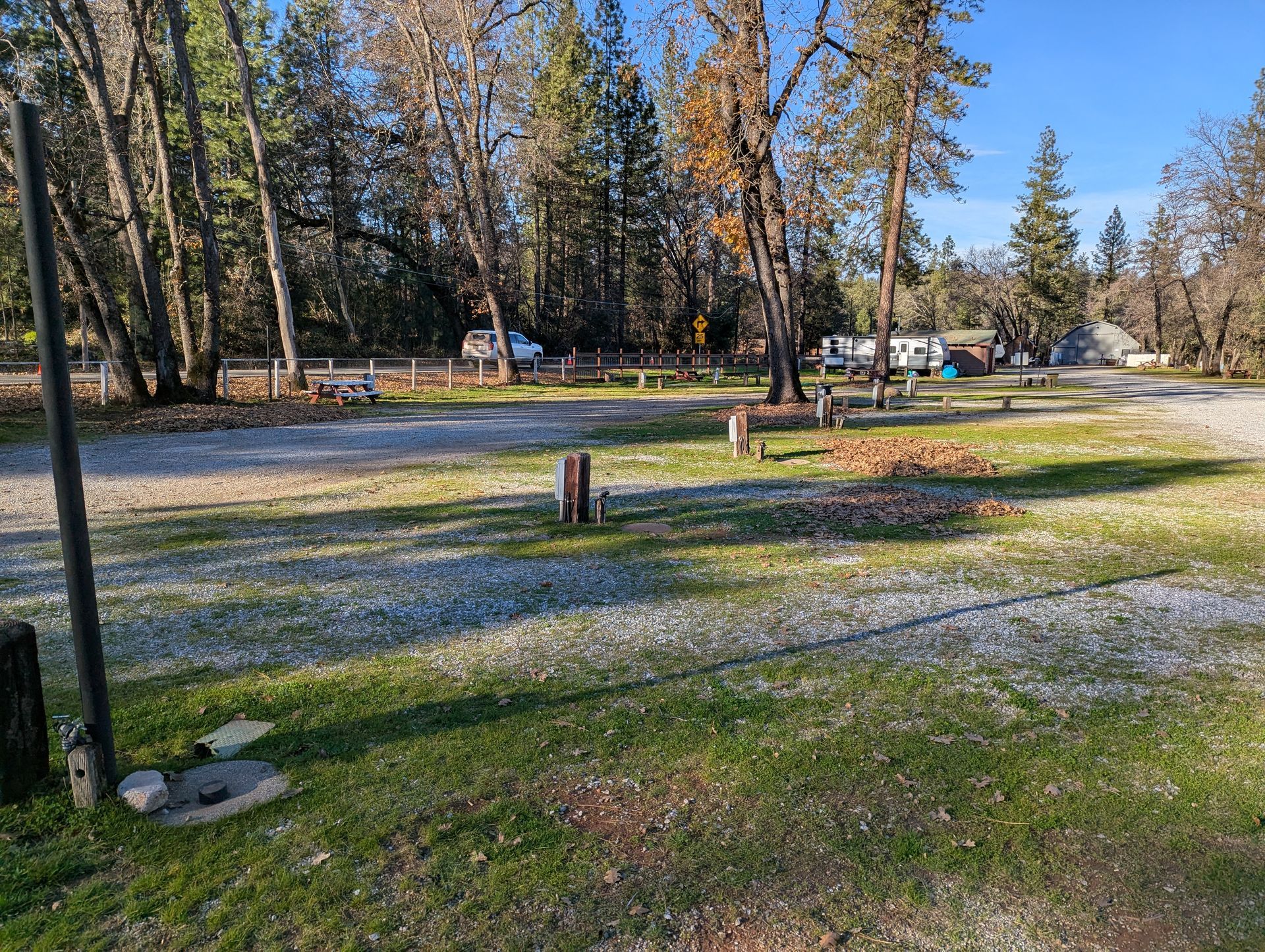 Pull-through sites accommodate larger vehicles. Steps from the lake