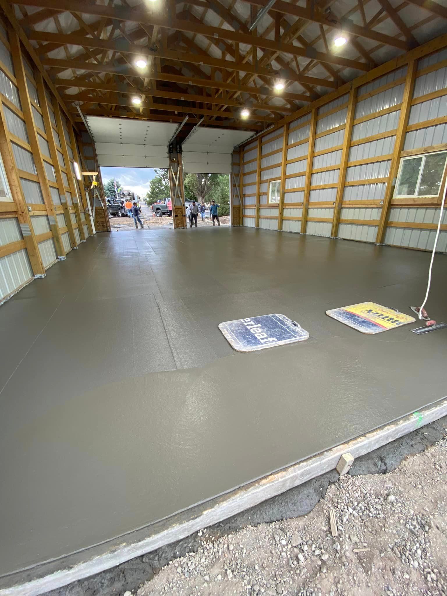 A wooden deck with stairs leading up to it