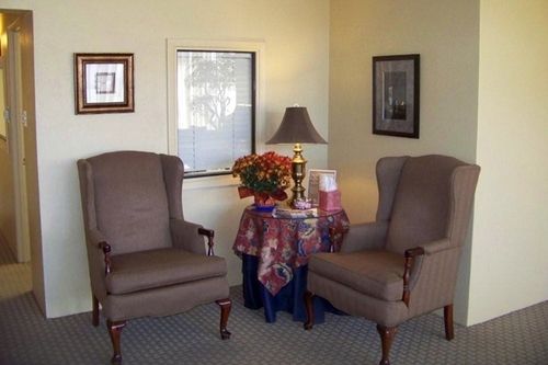 Two chairs for seating inside Denton Wood Funeral Home
