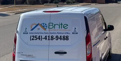 A white van with the word brite on the back