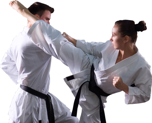 two adult sparring in martial arts