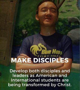 A man wearing a blue shirt that says blue heirs for christ