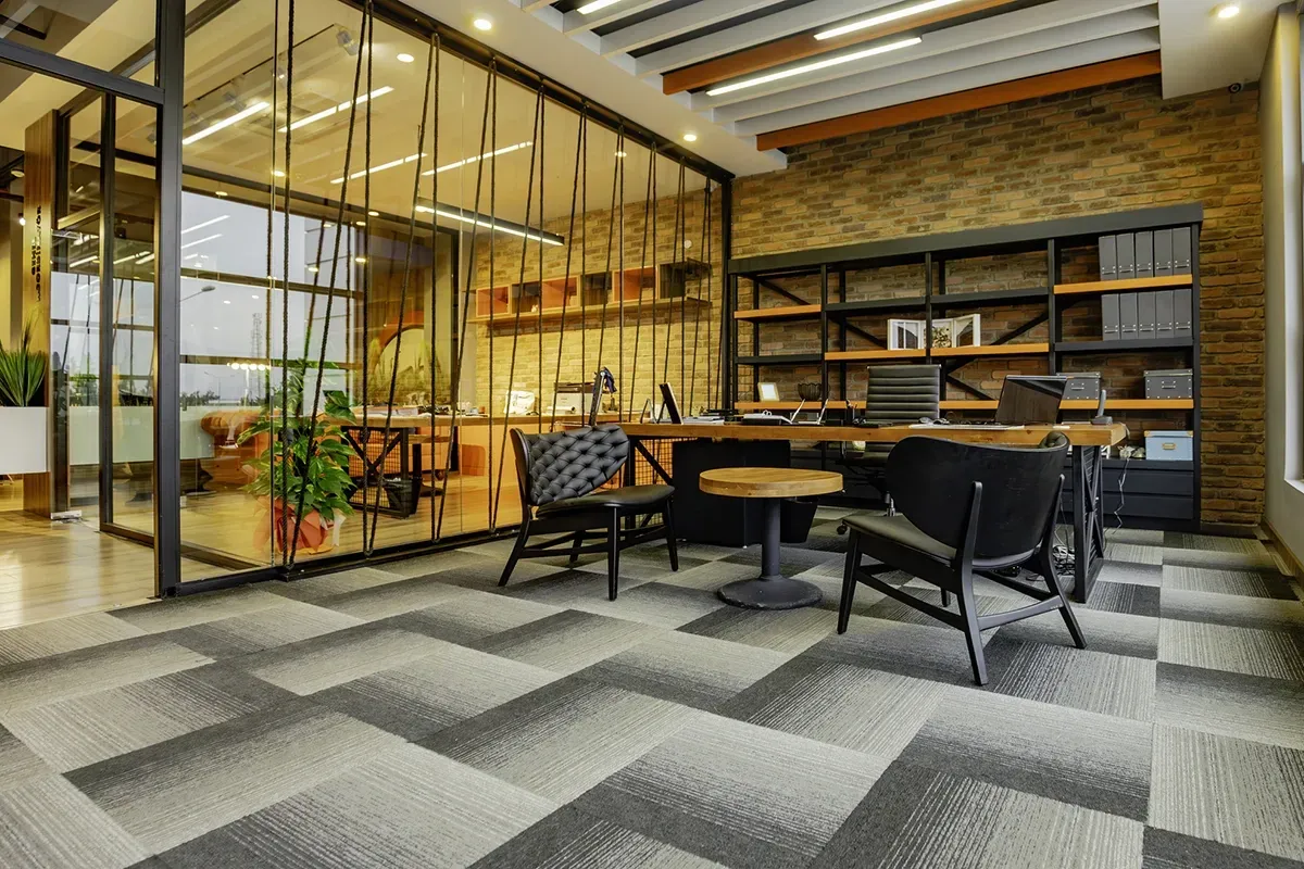 Flooring2 flooring products on display in an office themes showroom.