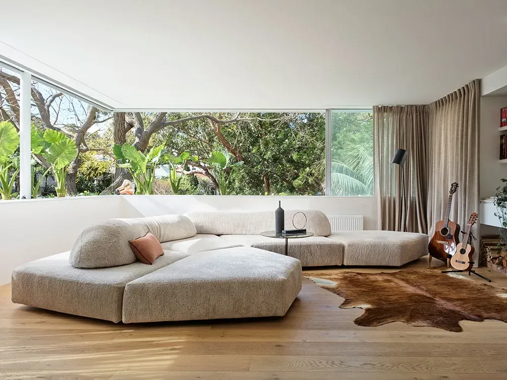 TOngue and groove flooring after installation in a modern living room.