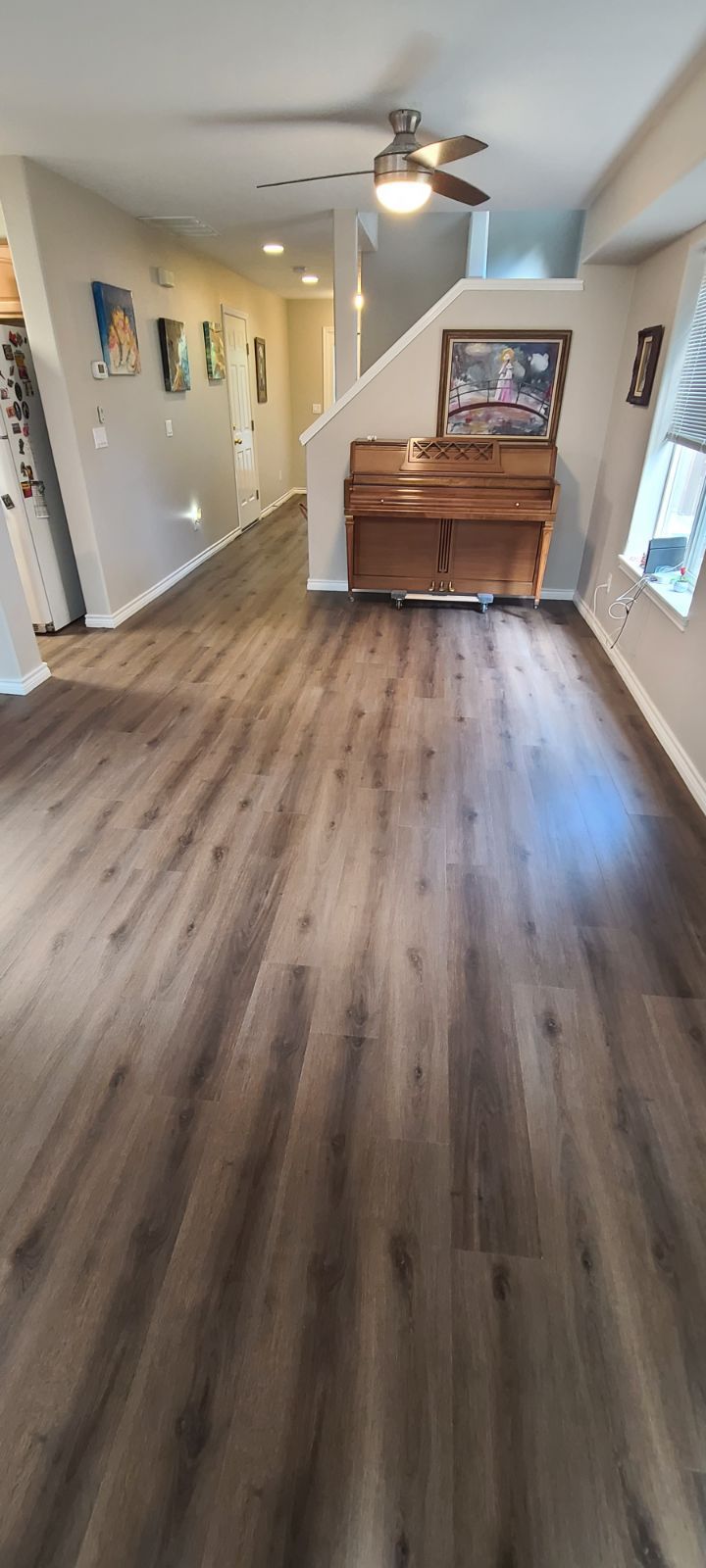Luxury vinyl flooring installed in living room in Sherwood, OR.