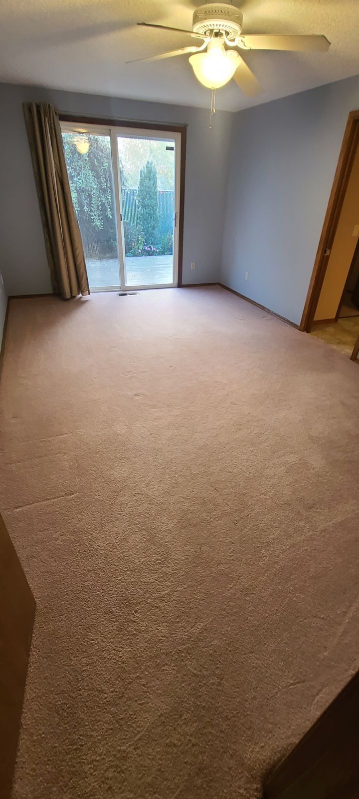 Bedroom with carpet floor.