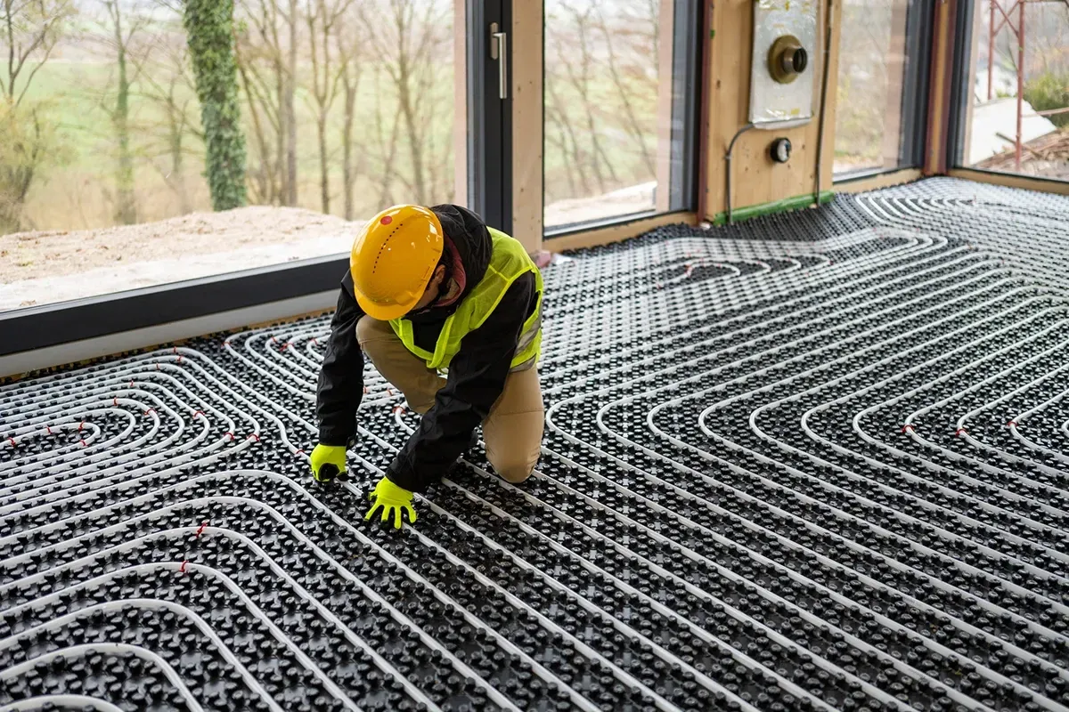 Installing heated floors.