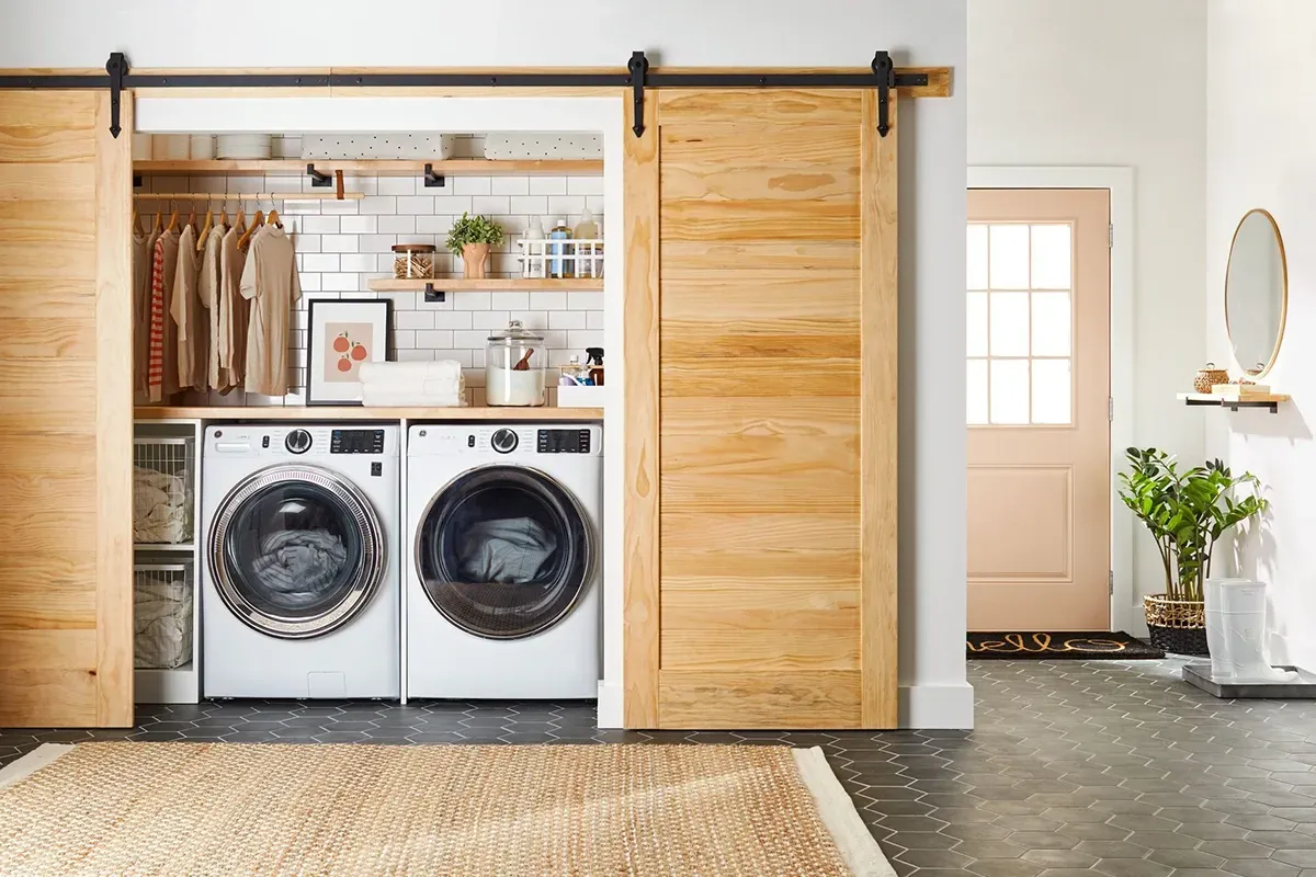 Neatly organized laundry room.