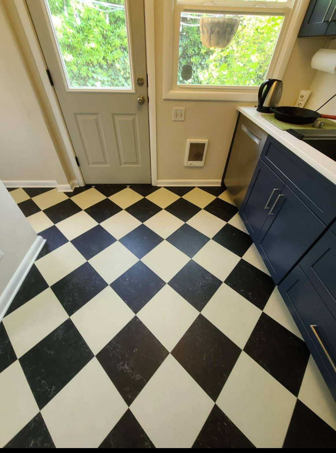 Marmoleum Cinch Loc Seal installed in kitchen.