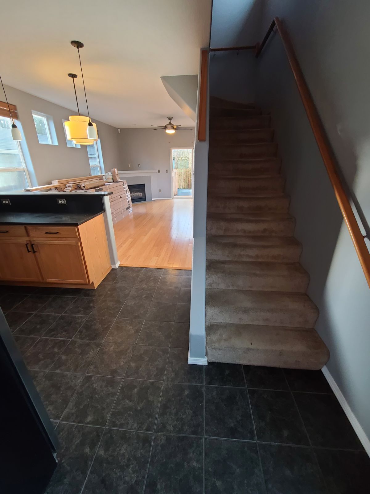 Staircase before installation of hardwood flooring for high traffic areas.