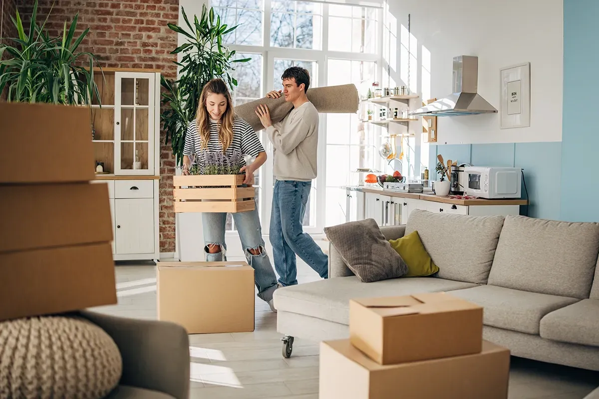Couple setting up their rental property.