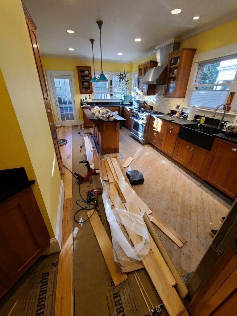 Another angle of the kitchen before flooring replacement.