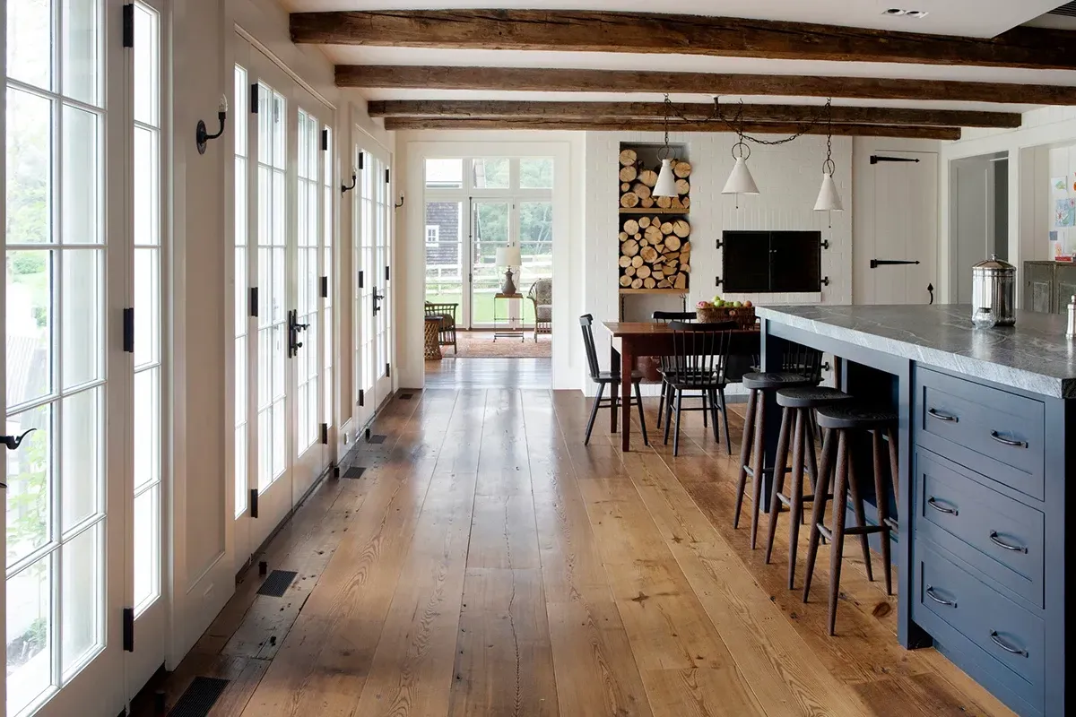 Wide plank solid hardwood flooring.
